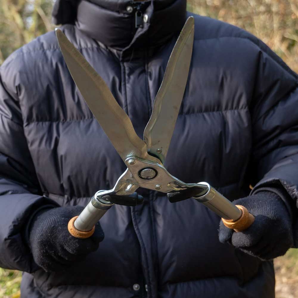 Now in Australia through Cannings: Berger German-made hedge shears with cork handles. 61cm long with 24cm wavy forged blades, shock absorbers, and sap grooves for clean, precise trimming. 5