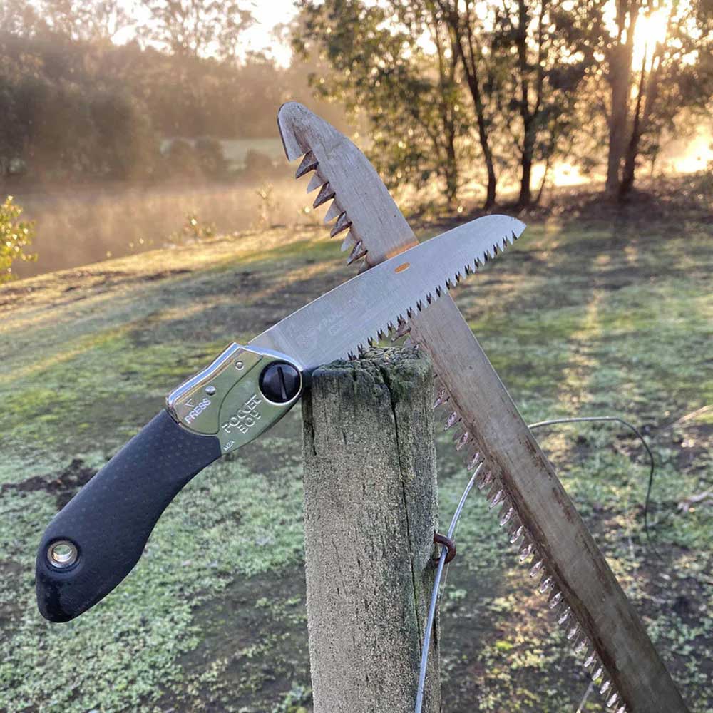 Compact, sharp, and built for outdoors, the Silky PocketBoy 130mm folding saw trusted by gardeners, arborists, hikers, and campers. Available in fine to large tooth options. black handle in action shot