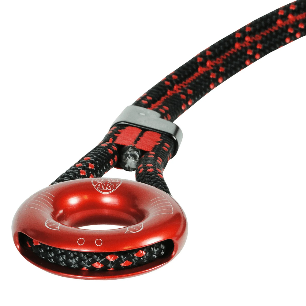 A close-up of a red anodized ART snake anchor with a black and red braided rope attached via a metal quick-release buckle, on a plain white background.